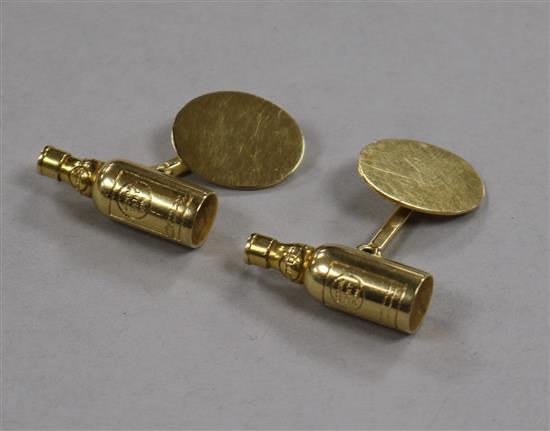 A pair of 14ct gold Wile Lemon Hart Rum bottle shaped cufflinks.